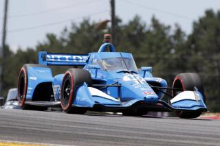 Alex Palou competes during an IndyCar auto race at Mid-Ohio Sports Car Course in Lexington, Ohio, Sunday, July 3, 2022. (AP Photo/Tom E. Puskar)