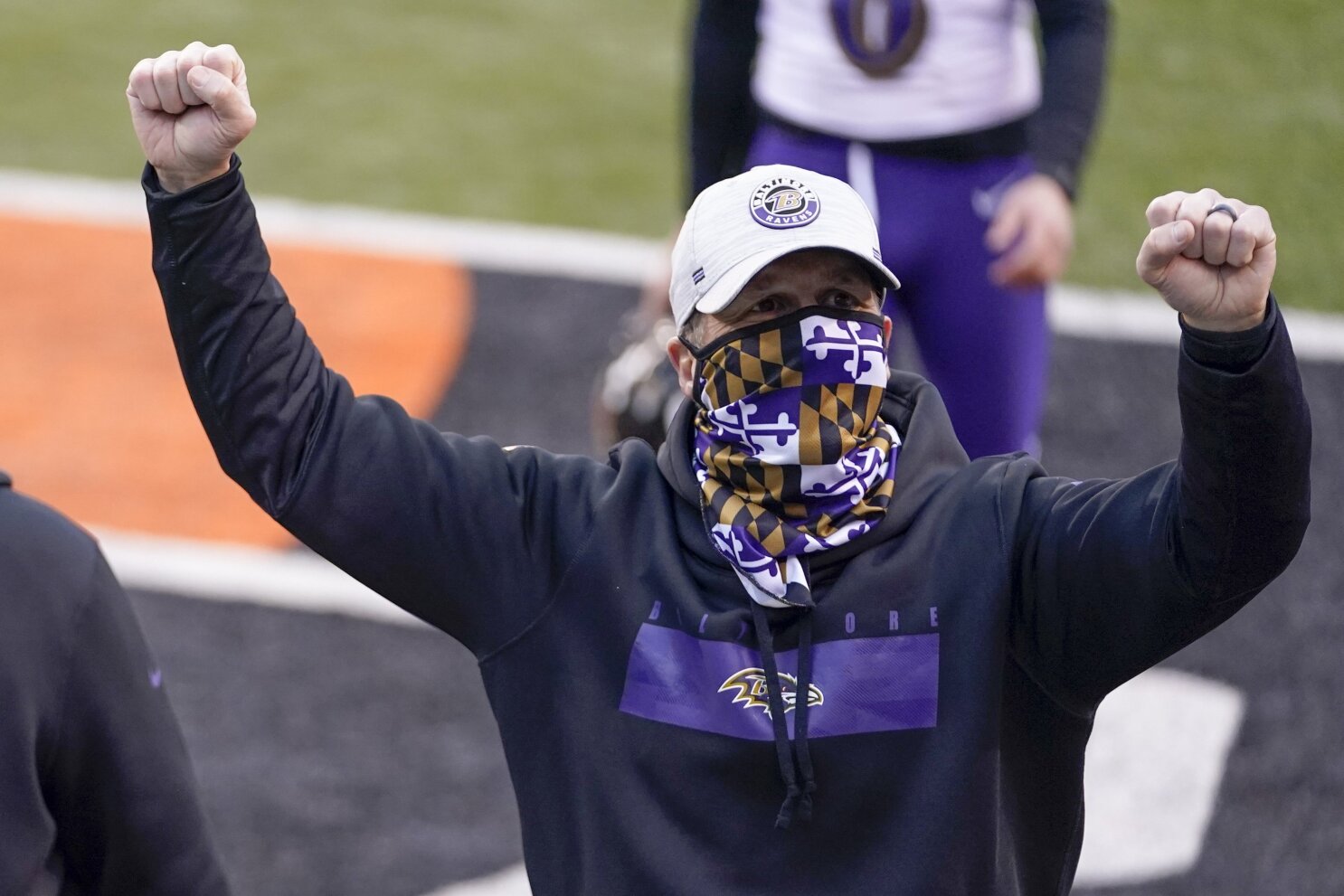 Harbaugh, Ravens happily travel road to success in playoffs