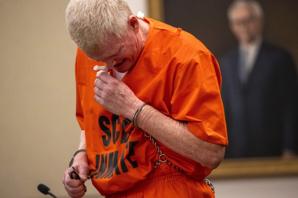 Alex Murdaugh cries as he addresses the court during his sentencing for stealing from 18 clients, Nov. 28, 2023, at the Beaufort County Courthouse in Beaufort, S.C. Murdaugh is scheduled to be sentenced Monday, April 1, 2024 on financial crime charges. It's likely the last time he will face a judge for punishment. (Andrew J. Whitaker/The Post And Courier via AP, Pool, file)