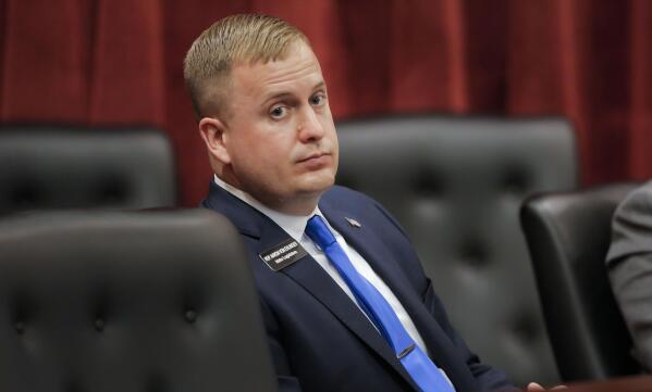 FILE - In this April 28, 2021 file photo, State Rep. Aaron von Ehlinger, R-Lewiston, listens as an alleged victim, identified as Jane Doe, offers testimony during a hearing before the Idaho Ethics and House Policy Committee in the Lincoln Auditorium at the Idaho Statehouse in Boise, Idaho. Von Ehlinger was before the committee to face sexual misconduct allegations with a 19-year-old volunteer staff member during the current legislative session.   As troubling as that case has been, it is just the latest in a long list of credible sexual misconduct accusations against state lawmakers since the #MeToo movement began more than three years ago.  (Darin Oswald/Idaho Statesman via AP)