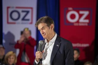 Dr. Mehmet Oz campaigns for U.S. Senate at the Elk's Lodge in Carlisle, Pa, Thursday, March 10, 2022. (Mark Pynes/The Patriot-News via AP)