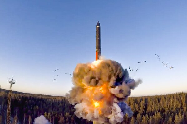 FILE - In this file photo taken from a video distributed by Russian Defense Ministry Press Service, on Wednesday, Dec. 9, 2020, a rocket launches from missile system as part of a ground-based intercontinental ballistic missile test launched from the Plesetsk facility in northwestern Russia. Russia and the United States exchanged documents Tuesday Jan 26, 2021, to extend the New START nuclear treaty, their last remaining arms control pact, the Kremlin said. The Kremlin readout of a phone call between U.S. President Joe Biden and Russian President Vladimir Putin said they voiced satisfaction with the move. (Russian Defense Ministry Press Service via AP, File)