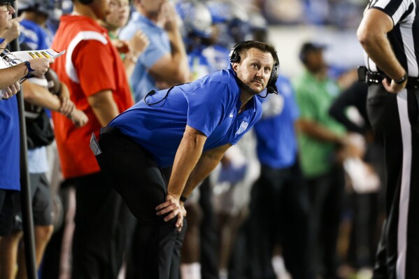 Memphis coach Ryan Silverfield looks up at the scoreboard during the team's NCAA college football game against Tulane on Friday, Oct. 13, 2023, in Memphis, Tenn. (Chris Day/The Commercial Appeal via AP)