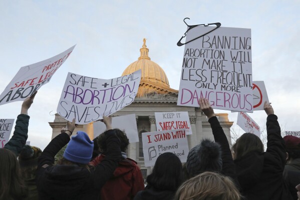 FILE - Demonstrators protest outside the Wisconsin Capitol, May 3, 2022, in Madison, Wis. Planned Parenthood of Wisconsin is asking the state Supreme Court to rule out a 174-year-old state law that conservatives have interpreted as an abortion ban. The organization filed a petition Thursday, Feb. 22, 2024 asking the high court to answer the question directly without letting any lower courts rule first. (Amber Arnold/Wisconsin State Journal via AP, File)