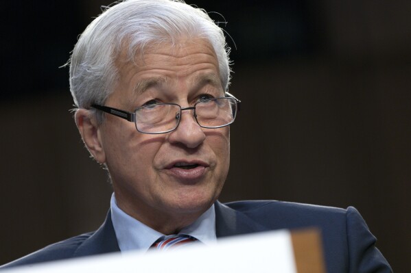 FILE - JPMorgan Chase & Company Chairman and CEO Jamie Dimon testifies at a Senate Banking Committee annual Wall Street oversight hearing, Thursday, Sept. 22, 2022, on Capitol Hill in Washington. Dimon and his family are planning to sell 1 million shares of the bank starting next year, according to a regulatory filing. This is Dimon's first such stock sale since he began his tenure with JPMorgan, the filing with the Securities and Exchange Commission said. (AP Photo/Jacquelyn Martin, File)