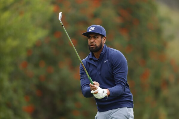 Tony Finau hits from the fourth tee during the third round of the Genesis Invitational golf tournament at Riviera Country Club, Saturday, Feb. 17, 2024, in the Pacific Palisades area of Los Angeles. (AP Photo/Ryan Kang)