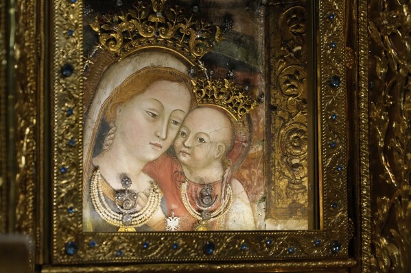 The image of Our Mother of Good Counsel is displayed in the Basilica of the Sanctuary in Genazzano, Italy, Thursday, May 15, 2025. (AP Photo/Gregorio Borgia)