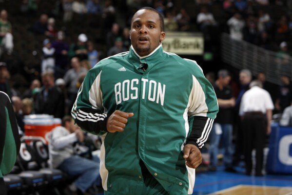 FILE - Boston Celtics forward Glen Davis warms up before facing the Denver Nuggets in the first quarter of an NBA basketball game in Denver on Monday, Feb. 23, 2009. Former Boston Celtics forward Glen “Big Baby” Davis was sentenced Thursday, May 9, 2024, to 40 months in a federal prison for his participation in a scheme that New York prosecutors said defrauded an insurance plan for NBA players and their families of more than $5 million.(AP Photo/David Zalubowski, File)