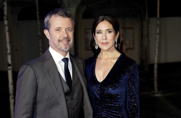 FILE - Danish Crown Prince Frederik and Crown Princess Mary present awards in the Concert Hall in the Musikhuset in Esbjerg, Denmark, Saturday Nov. 4, 2023. Thousands of people will gather in downtown Copenhagen on Sunday, Jan. 14, 2024 to witness a historic moment in one of the world’s oldest monarchies. Around 2 p.m. Queen Margrethe II will sign her abdication and about an hour later her eldest son will be proclaimed as King Frederik X on the balcony of Christiansborg Palace in the heart of the Danish capital. (Keld Navntoft/Ritzau Scanpix via AP, File)