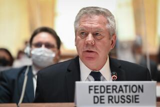 FILE - Russian ambassador Gennady Gatilov speaks at the opening of the 49th session of the UN Human Rights Council in Geneva, Switzerland, on, Feb. 28, 2022. The U.N.’s top human rights body has voted Friday to appoint an independent expert to step up scrutiny of Russia’s rights record at home. Russian ambassador Gennady Gatilov lashed out at the draft of the proposal as a “despicable document” and said its real aim was “to find yet another way of exerting leverage for bringing pressure to bear on Russia.” (Fabrice Coffrini/Keystone via AP, Pool, File)