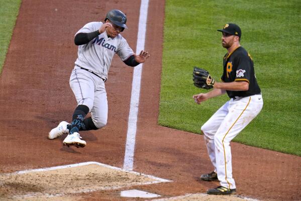 Marlins beat Pirates 8-1 and end 37-inning scoreless streak