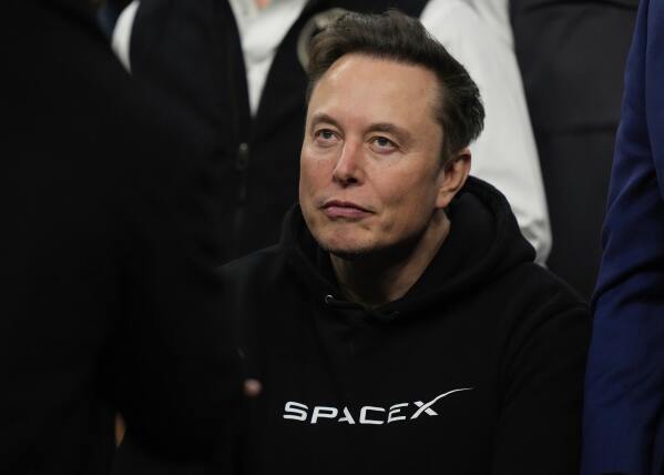 Elon Musk attends the finals for the NCAA wrestling championship, Saturday, March 22, 2025, in Philadelphia. (AP Photo/Matt Rourke, file)