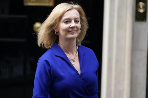 FILE - Britain's new Foreign Secretary Liz Truss leaves 10 Downing Street, in London, Wednesday, Sept. 15, 2021. Prime Minister Boris Johnson has announced the appointment of Foreign Secretary Liz Truss to become lead negotiator with the European Union, it was announced on Sunday, Dec, 19, 2021. The news comes a day after long-time ally David Frost resigned after a week political upheaval in the Conservative Party.  (AP Photo/Alberto Pezzali, File)