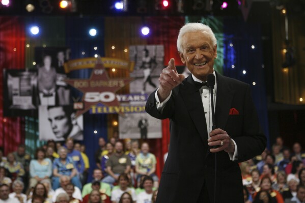 FILE - Legendary game show host Bob Barker reacts during filming of a special prime-time episode of "The Price Is Right," in Los Angeles April 17, 2007, celebrating his retirement and career on the popular game show. (AP Photo/Kevork Djansezian, File)