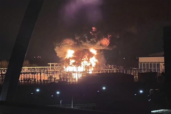 In this photo provided by Matthew Muirhead, a fire is seen at the North Hyde electrical substation near the Heathrow Airport in London, early Friday, March 21, 2025. (Matthew Muirhead via AP)