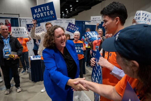 FILE - Rep. Katie Porter, who is running for U.S. Senate, shakes hands with supporters at the California Democratic Party Convention at SAFE Credit Union Convention Center in Sacramento, Calif., on Saturday, Nov. 18, 2023. (Lezlie Sterling/The Sacramento Bee via 番茄直播, File)