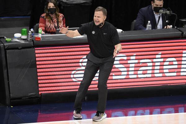 Washington Wizards coach Scott Brooks reacts during the first half of the team's NBA basketball Eastern Conference play-in game against the Indiana Pacers, Thursday, May 20, 2021, in Washington. (AP Photo/Nick Wass)