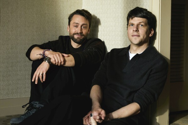 Kieran Culkin, left, and Jesse Eisenberg pose for a portrait to promote the film "A Real Pain" on Thursday, Oct. 17, 2024, in New York. (Photo by Taylor Jewell/Invision/AP)