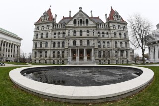 FILE - The New York state Capitol in Albany, N.Y., is visualized on Dec. 14, 2020. New york city's minimum-wage employees had more than simply the brand-new year to commemorate Monday, Jan. 1, 2024, with a pay bump beginning as the clock ticked over to 2024. In the very first of a series of yearly boosts slated for the Empire State, the base pay increased to $16 in New York City and a few of its suburban areas, up from $15. In the remainder of the state, the brand-new base pay is $15, up from $14.20. (AP Photo/Hans Pennink, File)