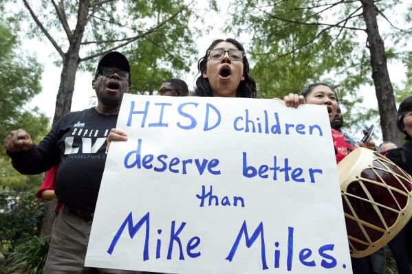 Houston Independent School District student Elizabeth Rodriguez leads community members to march and protest against the state takeover of Houston's public school district before the first Board of Managers meeting Thursday, June 8, 2023, at Hattie Mae White Educational Support Center in Houston. (Yi-Chin Lee/Houston Chronicle via AP)