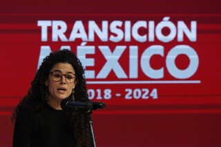 FILE - Luisa Maria Alcalde, slated to be Labor Secretary in the incoming administration, speaks at an event where Mexican President-elect Andres Manuel Lopez Obrador met with the heads of the Salinas Group and other business leaders in Mexico City, Nov. 22, 2018. The young Mexican lawyer, former legislator who has been the head of Labor in Obrador's administration, is expected be the number two in the cabinet when she is named Secretary of the Interior on Monday, June 19, 2023. (AP Photo/Rebecca Blackwell, File)