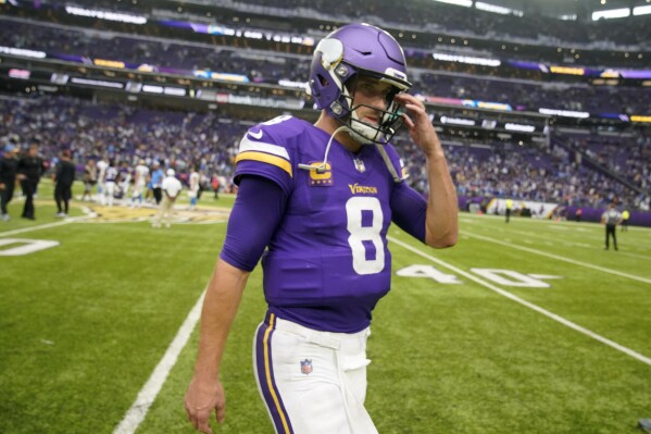 Minnesota Vikings quarterback Kirk Cousins (8) walks off the field after an NFL football game against the Los Angeles Chargers, Sunday, Sept. 24, 2023, in Minneapolis. The Chargers won 28-24. (AP Photo/Abbie Parr)