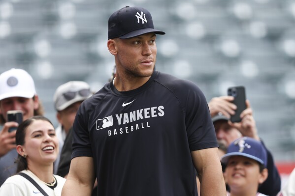 New York Yankees designated hitter Aaron Judge looks on during batting practice before a baseball game against the Los Angeles Angels in Anaheim, Calif., Wednesday, May 28, 2025. (AP Photo/Jessie Alcheh)
