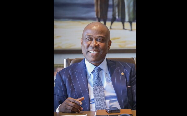 This undated photograph shows Herbert Wigwe, chief executive of Access Bank, Nigeria in his Lagos office. Wigwe was killed Friday, Feb. 9, 2024 along with his wife and son when a helicopter they were riding in crashed near in Southern California's Mojave Desert. (APPhoto/Ayodeji Owolabi)