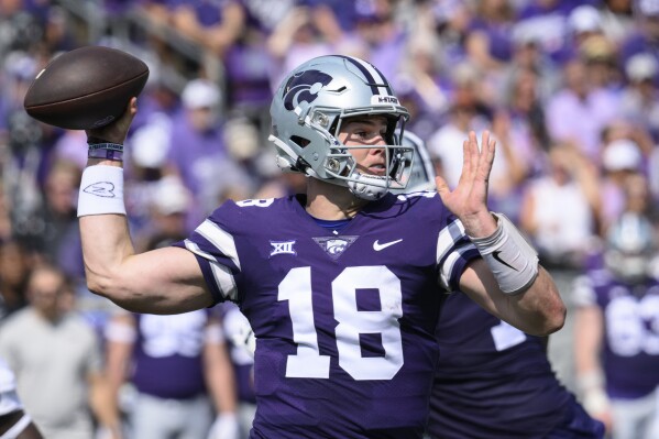 Kansas State quarterback Will Howard (18) throws against Troy during the first half of an NCAA college football game in Manhattan, Kan., Saturday, Sept. 9, 2023. (AP Photo/Reed Hoffmann