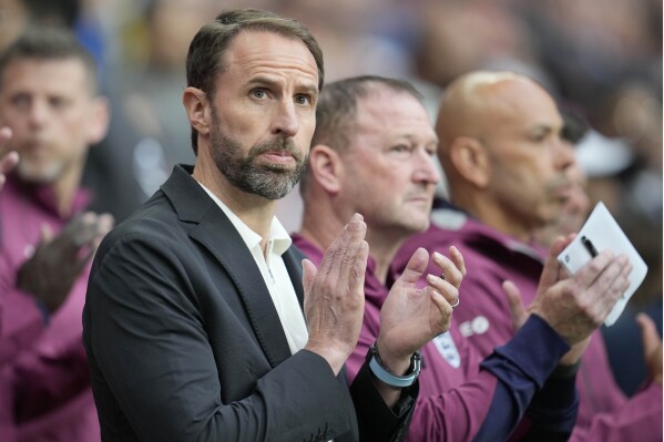 England's head coach Gareth Southgate applauds before the start of the International friendly soccer match between England and Iceland at Wembley stadium in London, Friday, June 7, 2024.(AP Photo/Kin Cheung)