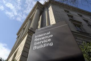 The exterior of the Internal Revenue Service (IRS) building in Washington, on March 22, 2013. On October 11, 2022, The Associated Press reported on revived false claims about IRS funding in the Inflation Reduction Act. (AP Photo/Susan Walsh, File)