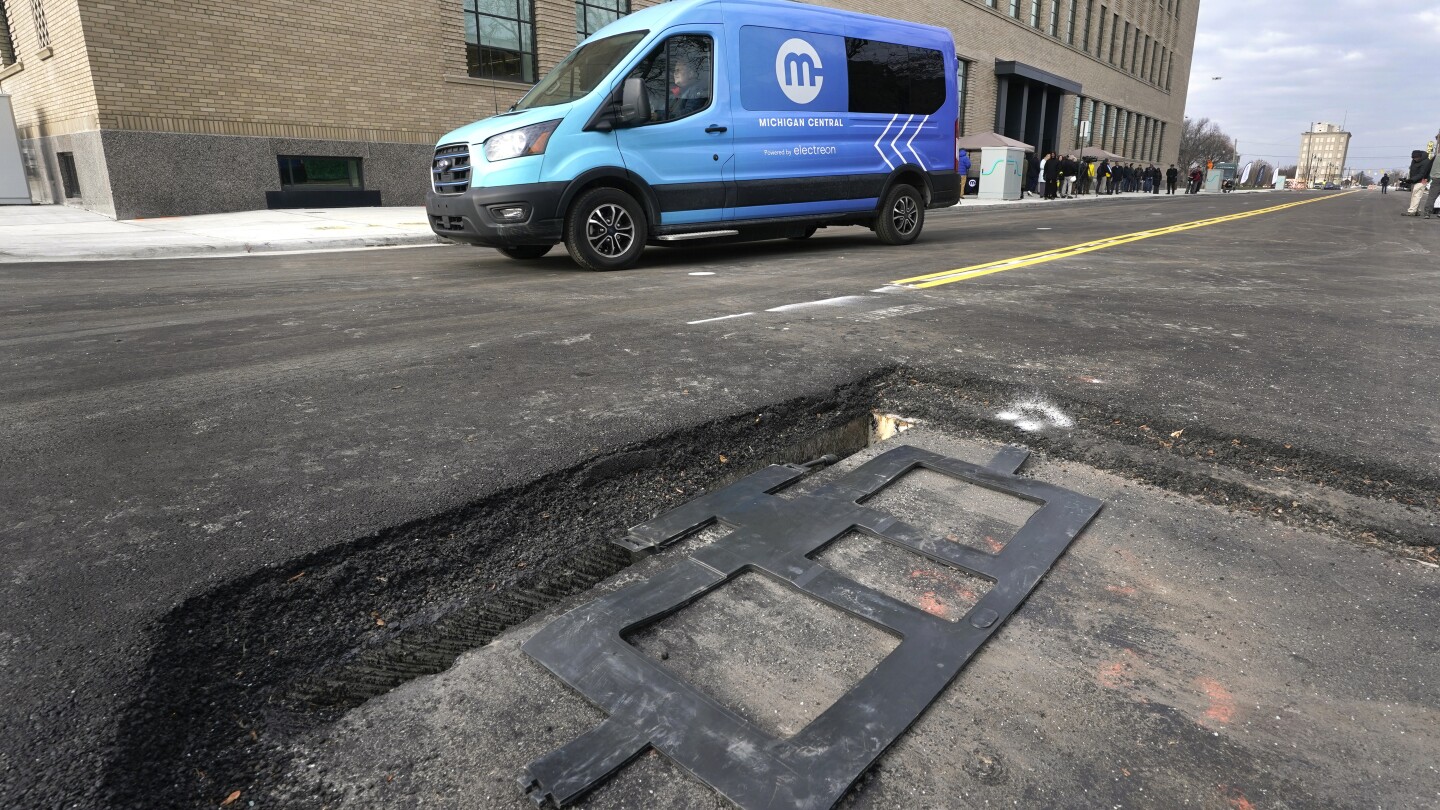 New technology installed beneath Detroit street can charge electric vehicles as they drive - The Associated Press