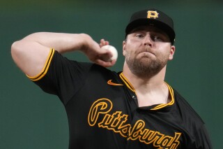 Pittsburgh Pirates relief pitcher David Bednar delivers during the ninth inning of a baseball game against the Cincinnati Reds in Pittsburgh, Monday, June 17, 2024. (AP Photo/Gene J. Puskar)
