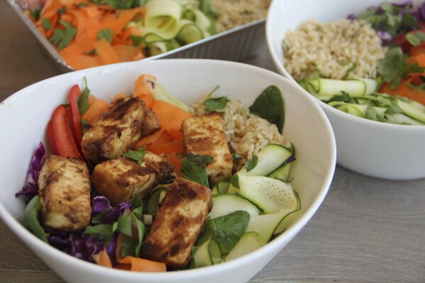 A Thai peanut, vegetable and tofu bowl is displayed for a photograph in Coronado, Calif., on April 29, 2017. (Melissa d'Arabian via AP, File)