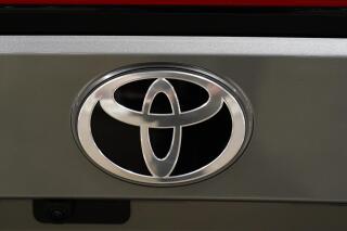 FILE - Shown is a Toyota logo at the Philadelphia Auto Show, Friday, Jan. 27, 2023, in Philadelphia. Toyota released results Wednesday, May 10, 2023 showing its January-March profit edged up 3% from the previous year on robust sales as a chips supply crunch gradually eased. (AP Photo/Matt Rourke, File)