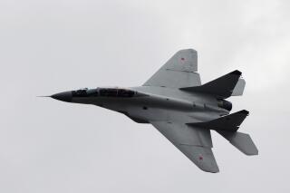 FILE - A Russian MIG-29 plane performs a flight during a celebration marking the Russian air force's 100th anniversary in Zhukovsky, outside Moscow, Russia on Aug. 11, 2012. Slovakia's defense minister says his country is ready to consider donating its Soviet-era warplanes to Ukraine. Jaroslav Nad says the Slovak air forces are planning to ground its fleet of 11 MiG-29 fighter jets “most probably” by the end of August. (AP Photo/Misha Japaridze, File)