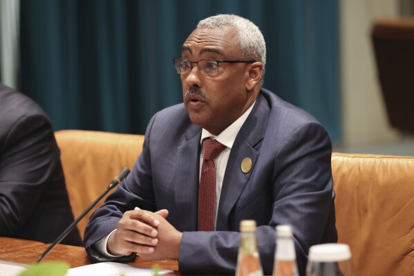 FILE - Ethiopian Deputy Prime Minister and Foreign Minister Demeke Mekonnen attends a meeting with U.S. Secretary of State Antony Blinken in Riyadh, Saudi Arabia on June 8, 2023. Violent unrest is escalating in Ethiopia’s Amhara region as federal security forces clash with a local ethnic militia, leading the deputy prime minister in an unusually outspoken statement to call the situation “increasingly grave.” (Ahmed Yosri/Pool Photo via AP, File)