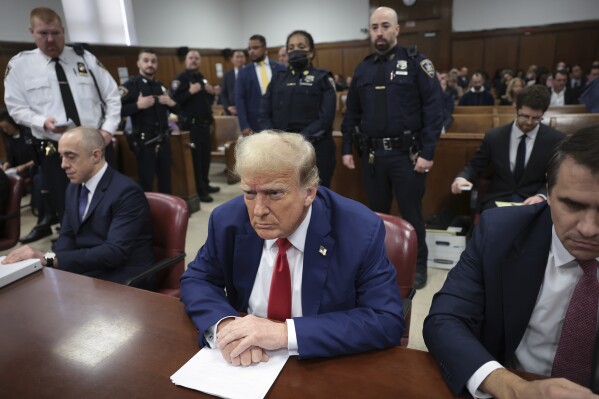 Former President Donald Trump attends a trial in Manhattan Criminal Court on Monday, May 6, 2024, in New York.  (Win McNamee/Pool photo via AP)