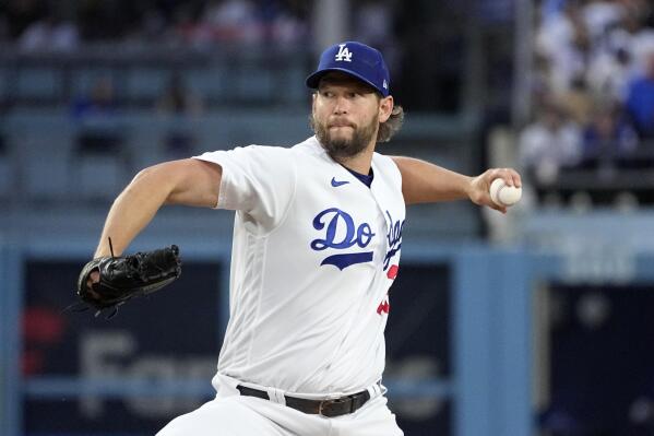 Los Angeles Dodgers starting pitcher Clayton Kershaw throws to the plate during the first inning of a baseball game against the New York Mets Tuesday, April 18, 2023, in Los Angeles. (AP Photo/Mark J. Terrill)