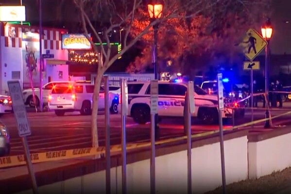In this image made from video provided by AZFamily.com, first responders work the scene of a shooting in Glendale, a suburb of Phoenix, Ariz., Sunday, May 4, 2025. (AZFamily.com via AP)
