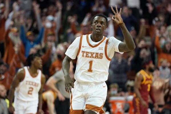 Texas guard Andrew Jones (1) reacts to a score against the Iowa State during the first half of an NCAA college basketball game, Saturday, Feb. 5, 2022, in Austin, Texas. (AP Photo/Eric Gay)