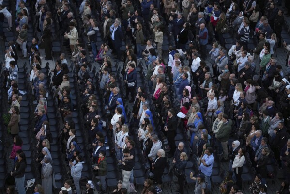 Faithful gather for a rosary prayer for the late Pope Francis, in St. Peter's Square at the Vatican, Monday April 21, 2025 (AP Photo/Andrew Medichini)