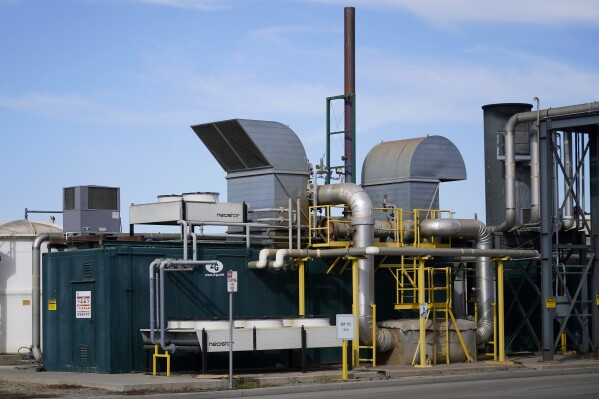 CORRECTS NAME OF FACILITY TO GREENWASTE RENEWABLE ENERGY DIGESTION FACILITY FROM GREENWASTE ZANKER RESOURCE RECOVERY FACILITY - Generators that will convert biogas into electricity sit at a GreenWaste Renewable Energy Digestion Facility in San Jose, Calif., Friday, Oct. 27, 2023. For the first time since the 1990s, the EPA updated its ranking of preferred strategies for waste reduction, ranging from preventing wasted food altogether (by not producing or buying it in the first place) to composting or anaerobic digestion, a process by which food waste can be turned into energy in the form of biogas. (AP Photo/Jeff Chiu)