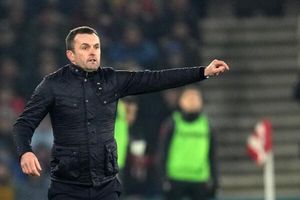 Southampton's manager Nathan Jones gives instructions to his players during the EFL Cup semifinal, first leg soccer match between Southampton and Newcastle United at St Mary's Stadium in Southampton, England, Tuesday, Jan. 24, 2023. (AP Photo/Kin Cheung)