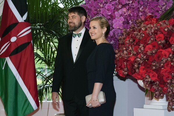 Kate Gallego, Mayor of Phoenix and Mark Weinberg arrive at the Booksellers area of the White House for the State Dinner hosted by President Joe Biden and first lady Jill Biden for Kenya's President William Ruto and Kenya's first lady Rachel Ruto, Thursday, May 23, 2024, in Washington. (AP Photo/Jacquelyn Martin)