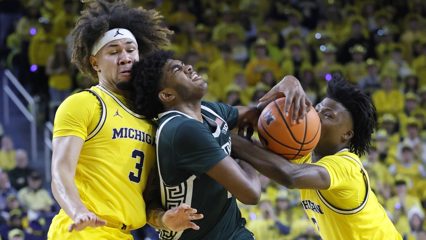 Michigan State tops Michigan 75-72, claims Big Ten lead
