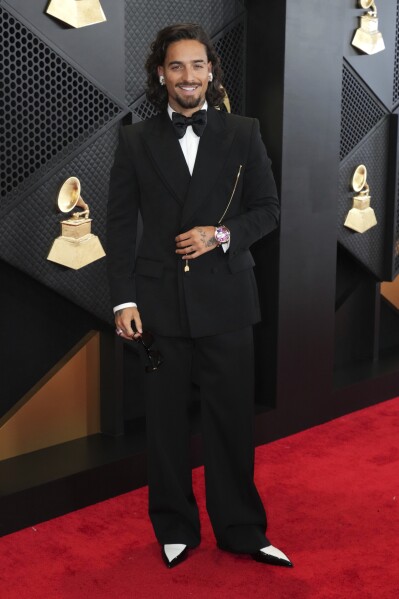 Maluma arrives at the 66th annual Grammy Awards on Sunday, Feb. 4, 2024, in Los Angeles. (Photo by Jordan Strauss/Invision/AP)