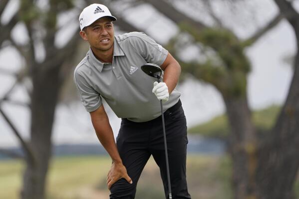 FILE - In this June 20, 2021, file photo, Xander Schauffele watches his shot from the fifth tee during the final round of the U.S. Open Golf Championship at Torrey Pines Golf Course in San Diego. Schauffele was No. 427 in the world when the Olympics last were held. Now he's part of the U.S. team in Tokyo. (AP Photo/Jae C. Hong, File)