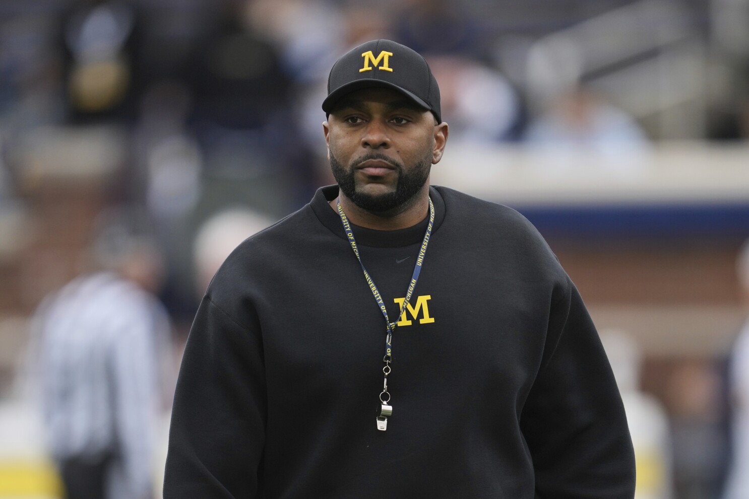 Michigan to suspend Sherrone Moore for 2 games, AP sources say