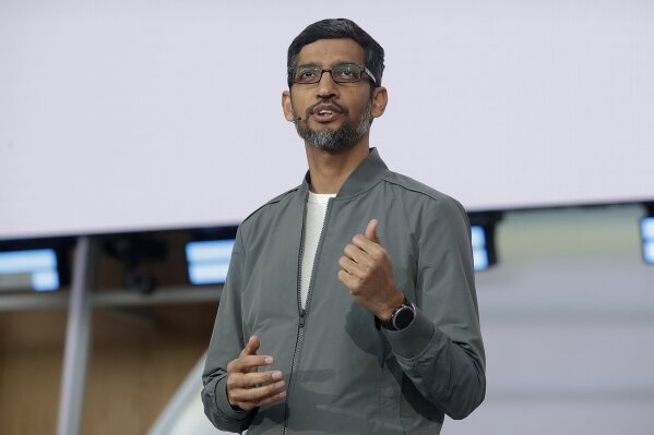 FILE - In this May 7, 2019 file photo, Google CEO Sundar Pichai speaks during the keynote address of the Google I/O conference in Mountain View, Calif. Google co-founders Larry Page and Sergey Brin are stepping down from their roles within the parent company, Alphabet. Pichai will stay in his role and also become CEO of Alphabet. (AP Photo/Jeff Chiu, File)
